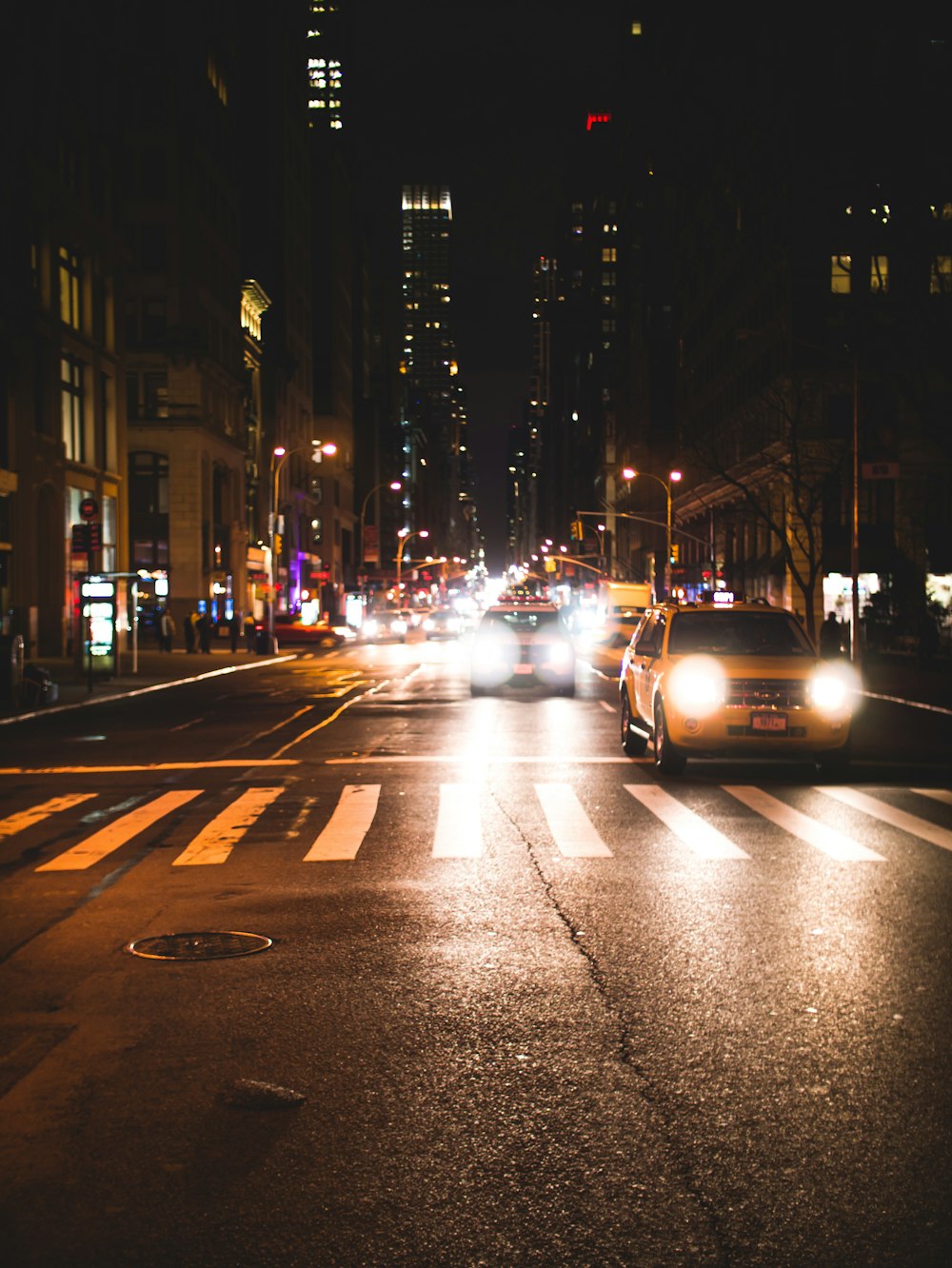 cars on road during night time