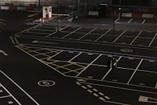 Secure parking area with ample space and well-lit surroundings.