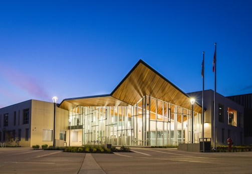 Commercial building exterior featuring low voltage landscape lighting