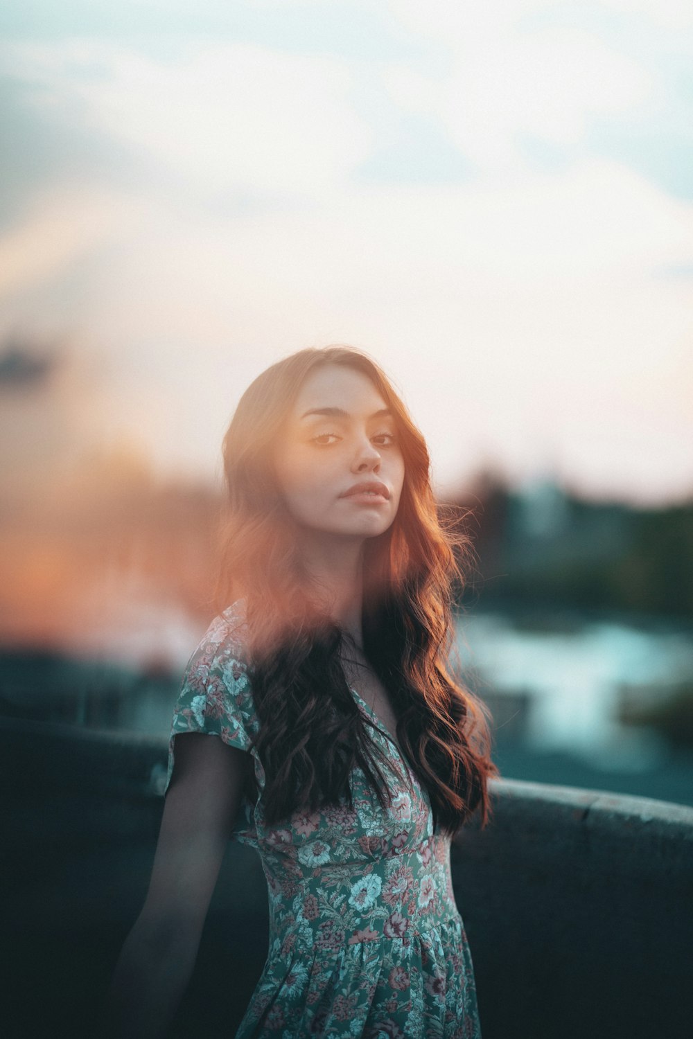 woman in blue and white floral shirt