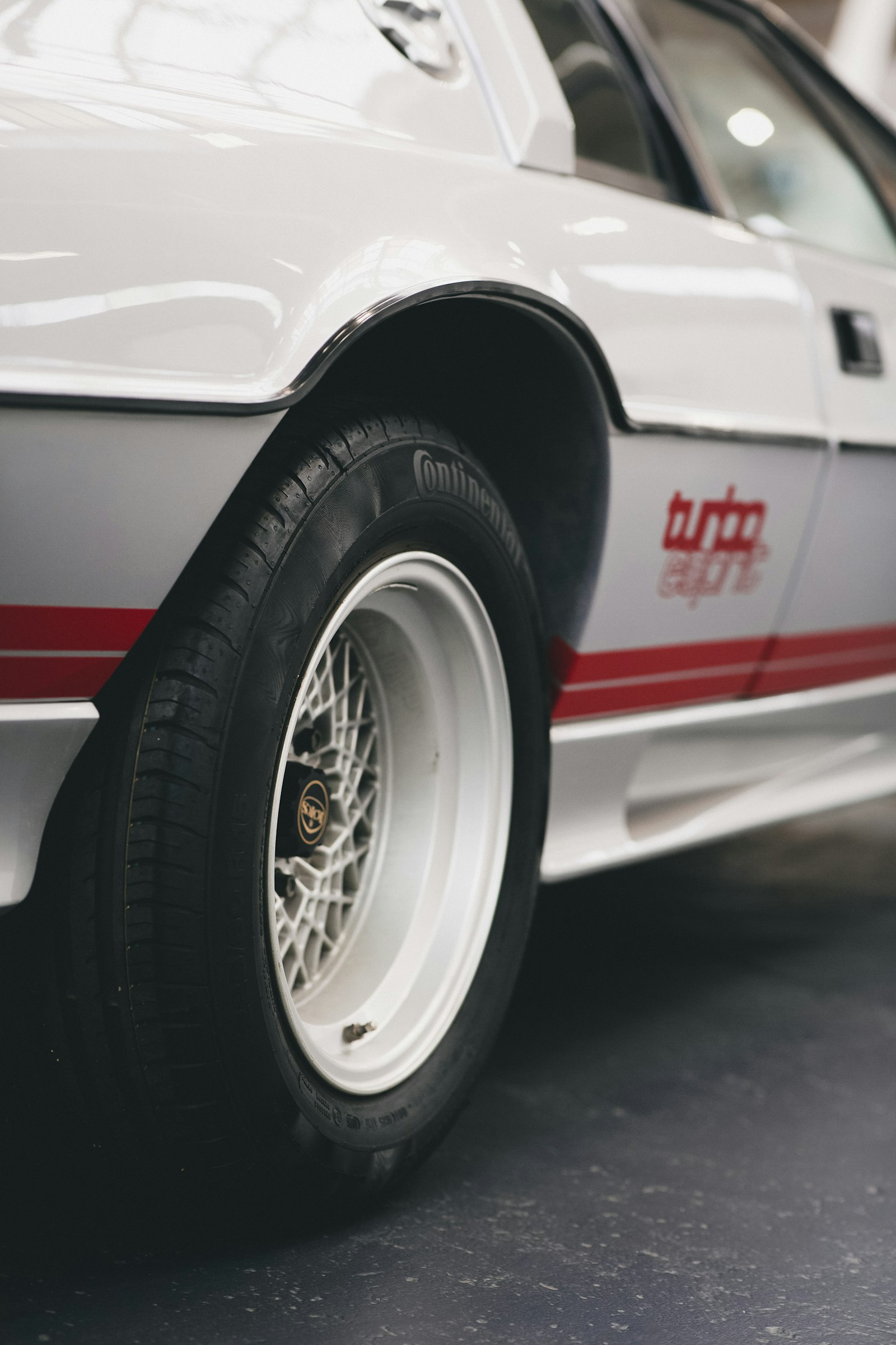 Canon EOS 5D Mark III + Canon EF 85mm F1.4L IS USM sample photo. White and red car photography