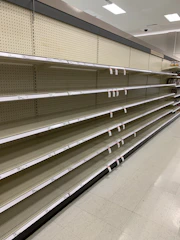 Inventory shelves with visible shrinkage marked for review