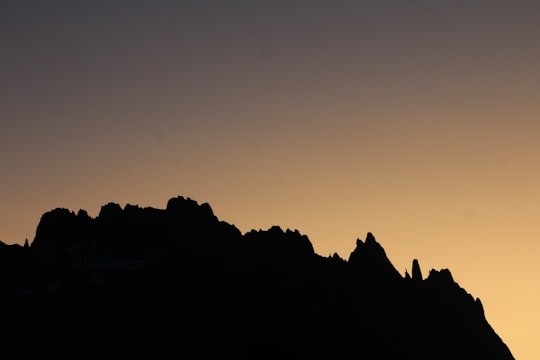 silhouette of mountain during sunset in Lago Huechulafquen Argentina