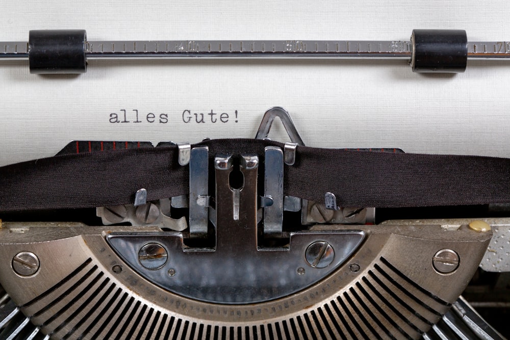 blue typewriter on white table