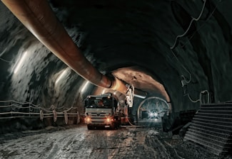 red and black truck in tunnel