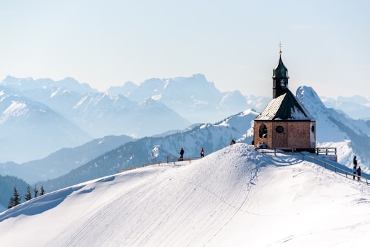 brown and white house on snow covered mountain during daytime in Rottach-Egern Germany