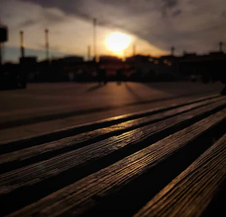 Sunlight casting shadows on a watercolor landscape painting in progress