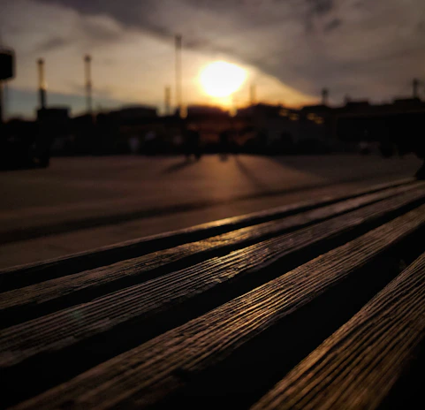 Sunlight casting shadows on a watercolor landscape painting in progress