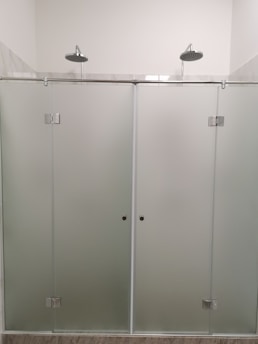 Modern shower system with sleek design in a bright bathroom