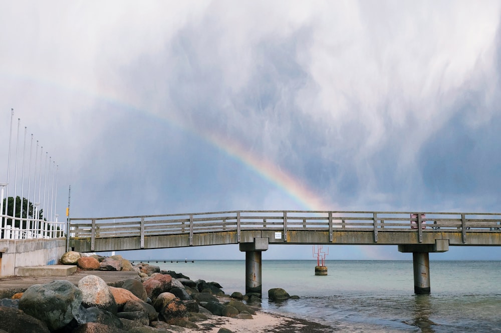 gray concrete bridge over water