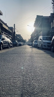 Surveyors conducting a valuation assessment on a residential property under bright daylight.