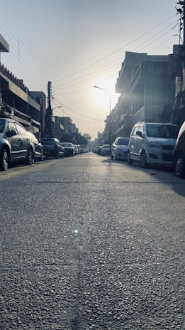 Surveyors conducting a valuation assessment on a residential property under bright daylight.