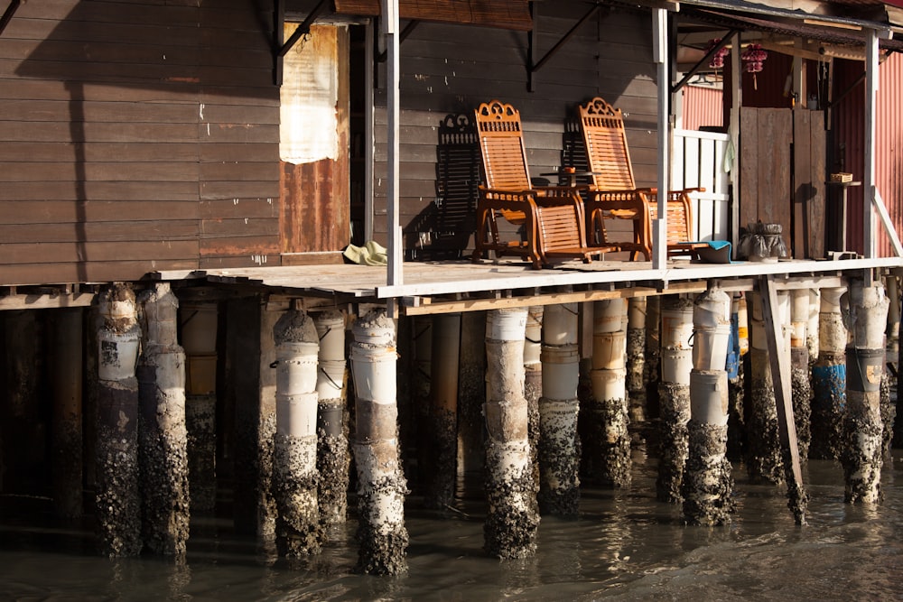 brown wooden chair on water