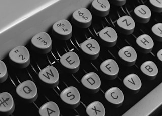 black and white typewriter keyboard