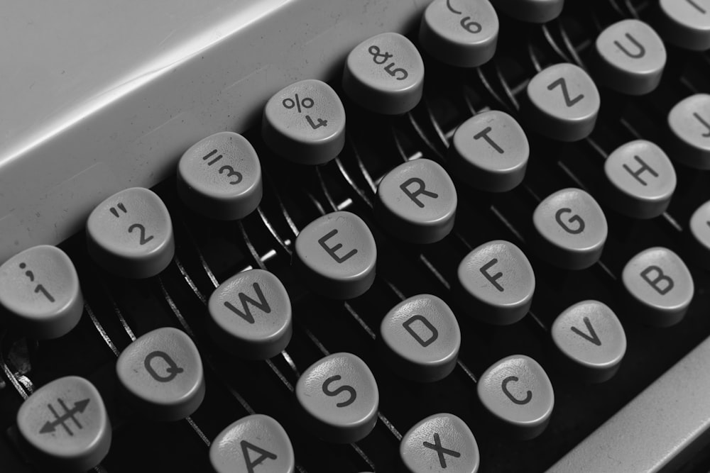 black and white typewriter keyboard