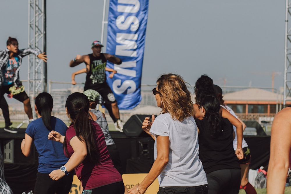 people gathering on a concert during daytime