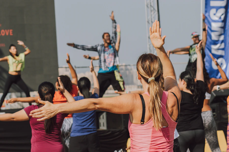 A high-energy dance class mid-movement — the class pass