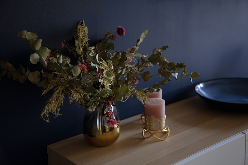 pink roses in clear glass vase