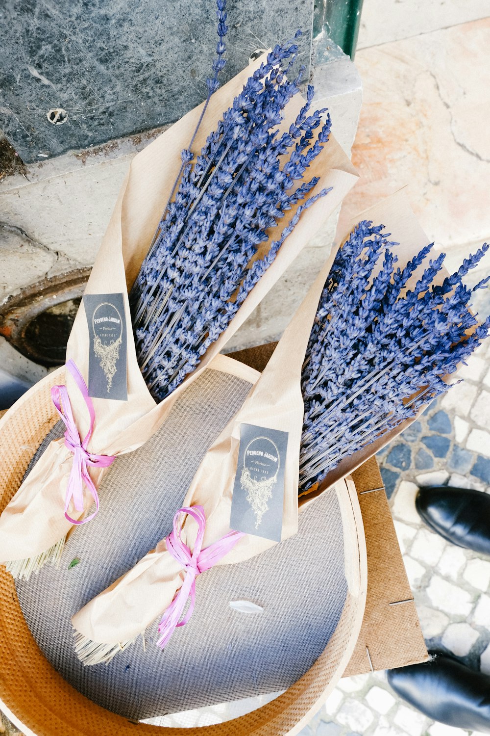 blue and white textile on brown wooden table