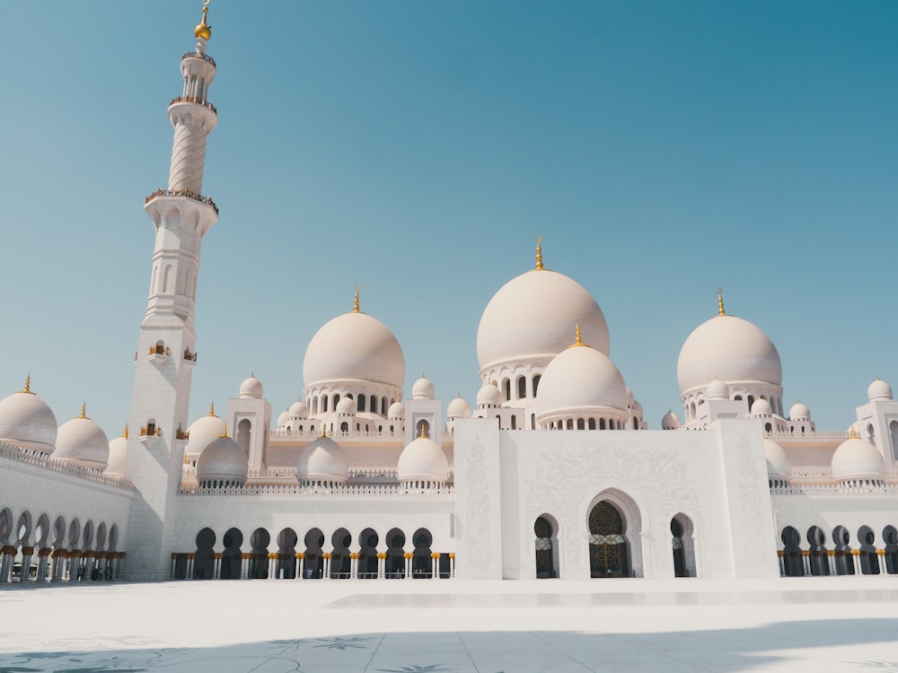 white concrete dome building under blue sky during daytime