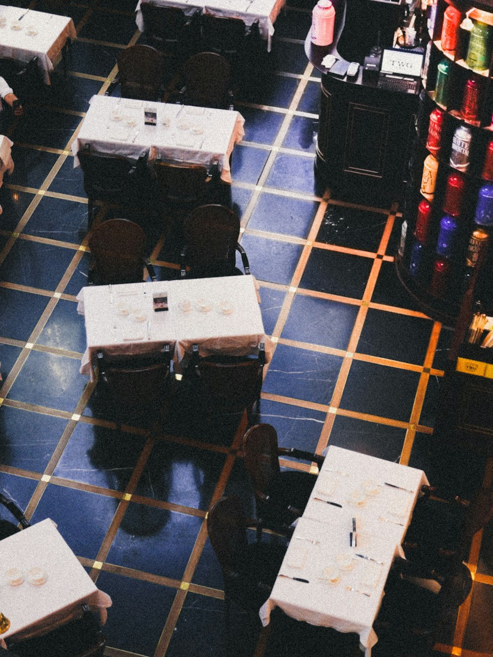 black and white box on blue floor tiles