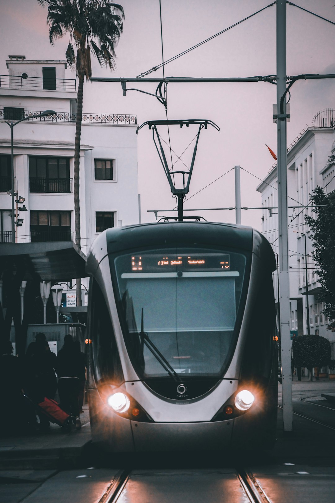 black and white tram on road during daytime