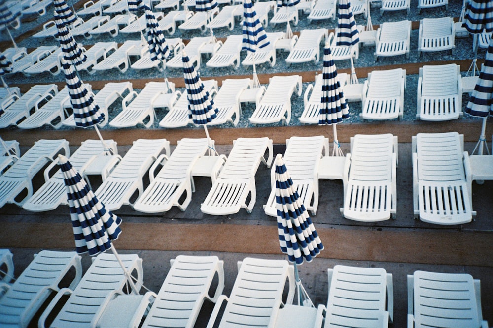white and blue plastic chairs