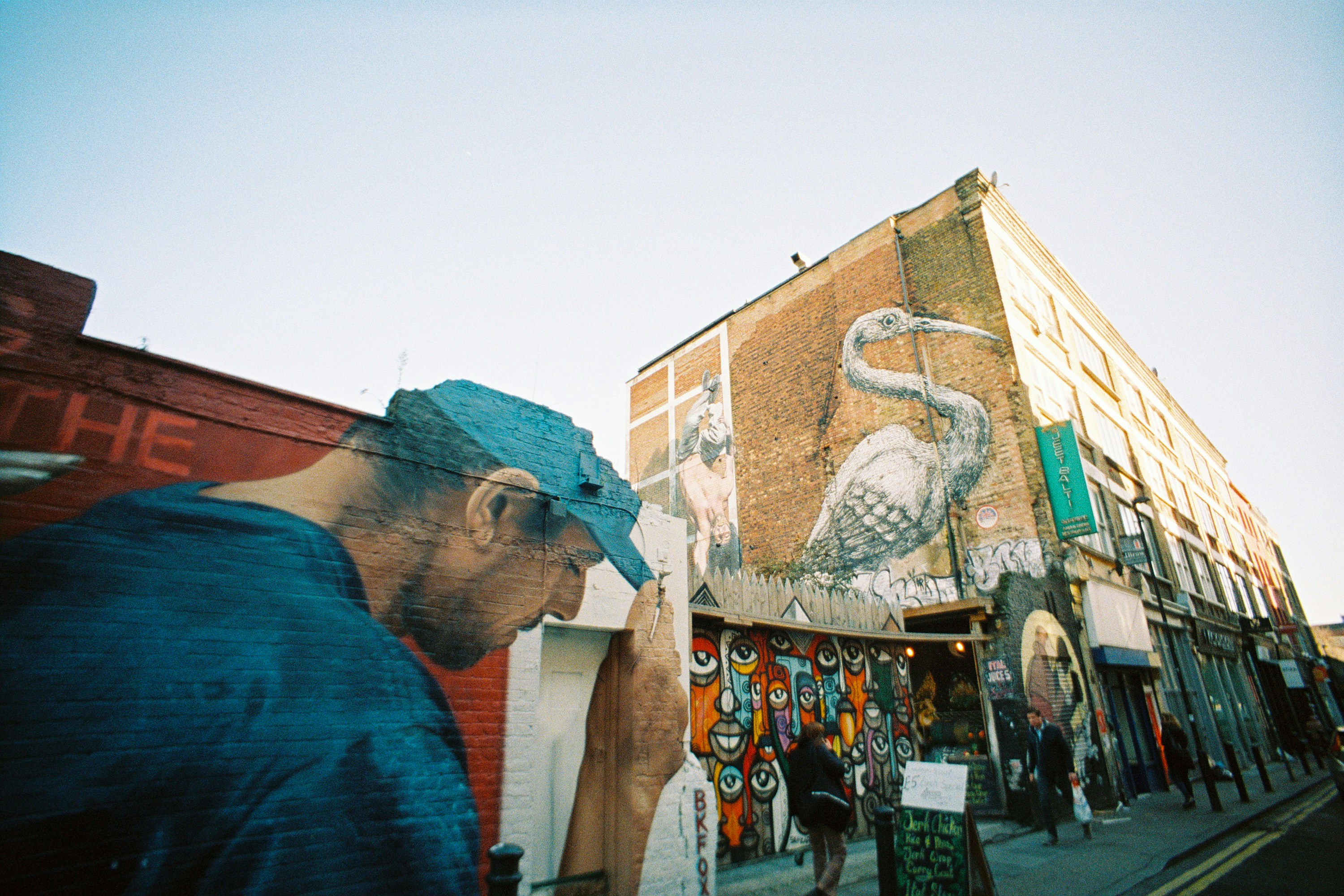 Graffiti on buildings in Brick Lane in London. Shot on film.