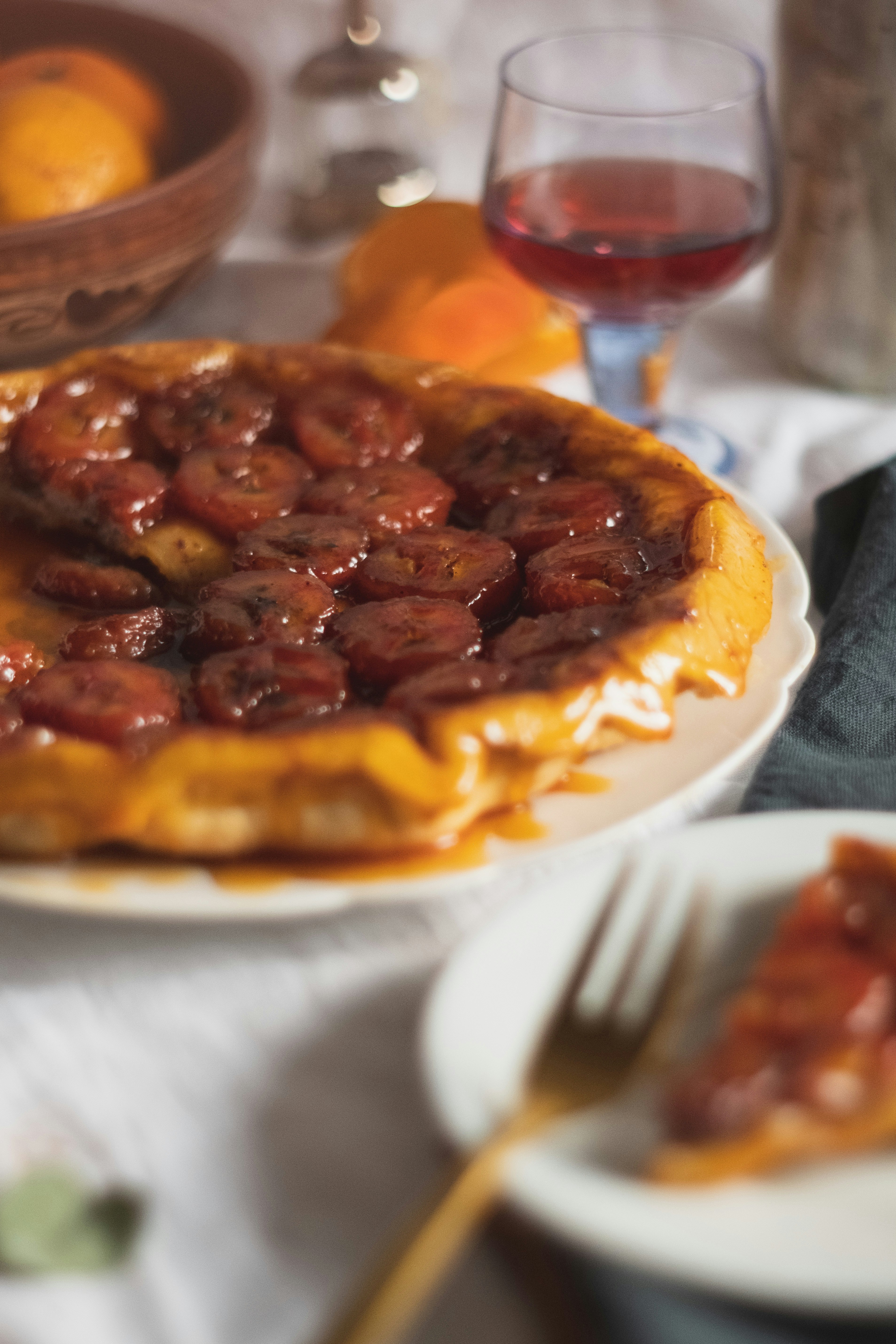 brown and yellow pie on white ceramic plate