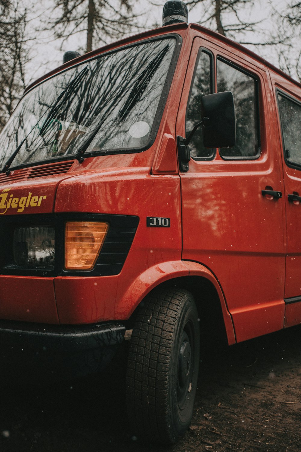 red and yellow bus on road