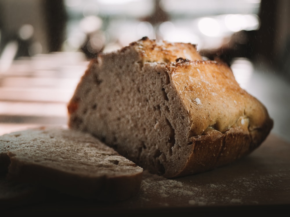 sliced bread on brown wooden table