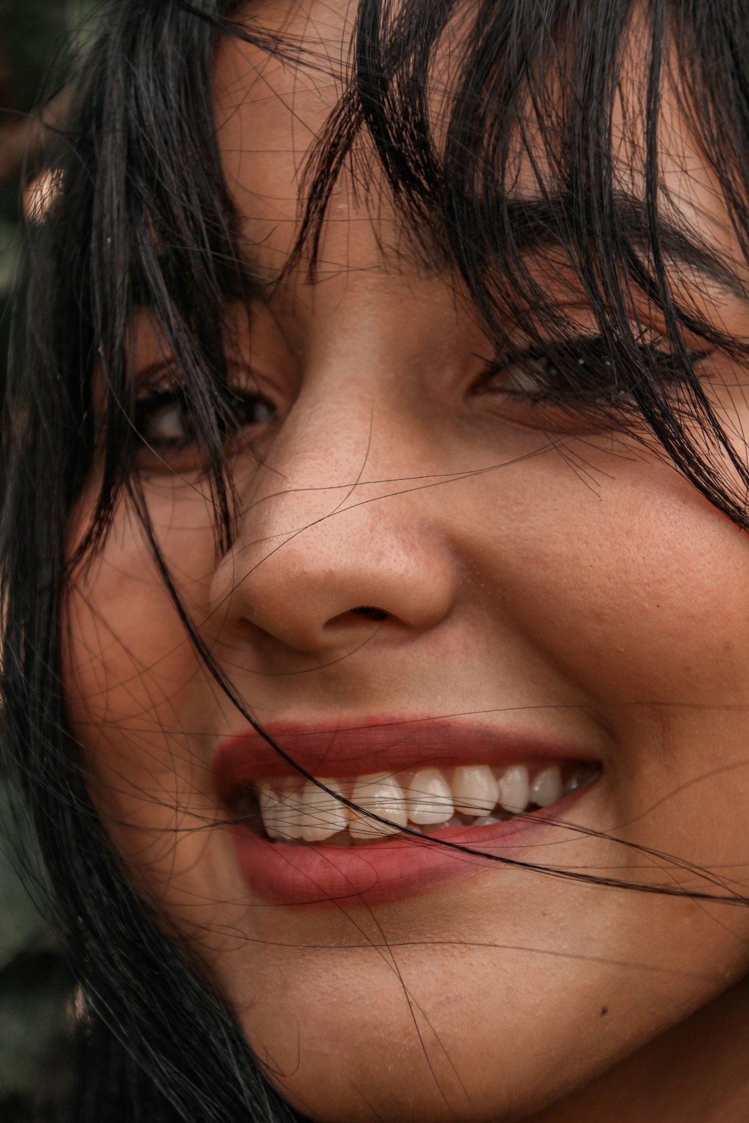 woman with brown hair smiling