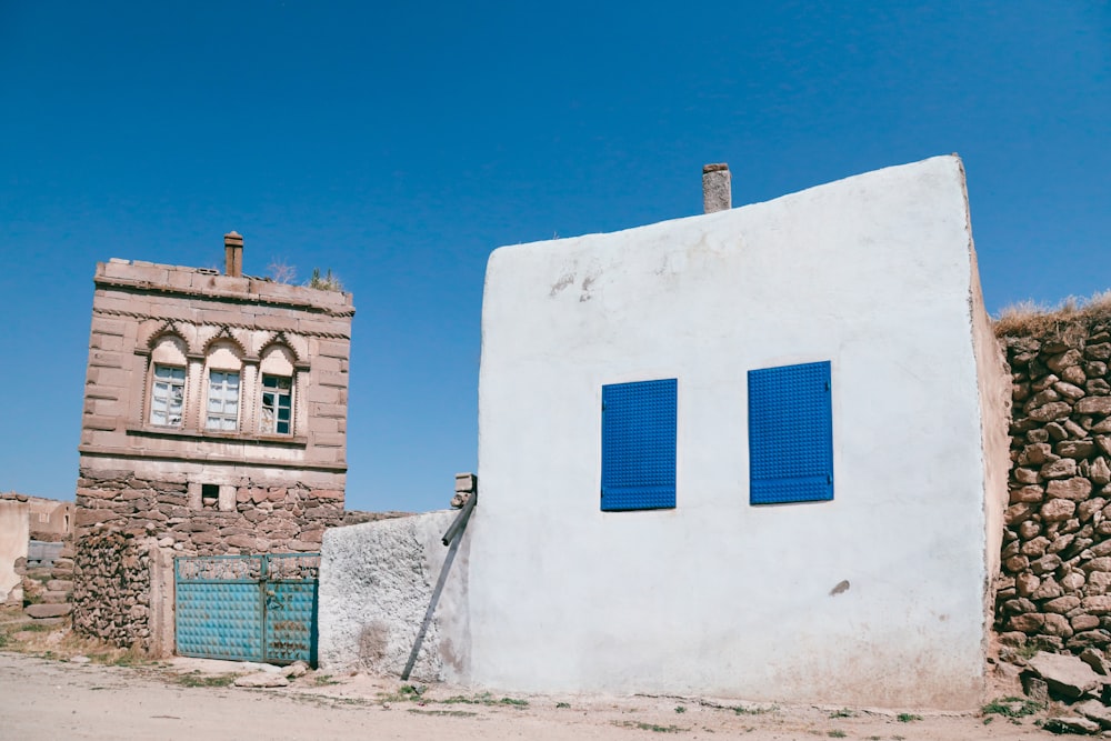 white concrete building under blue sky during daytime