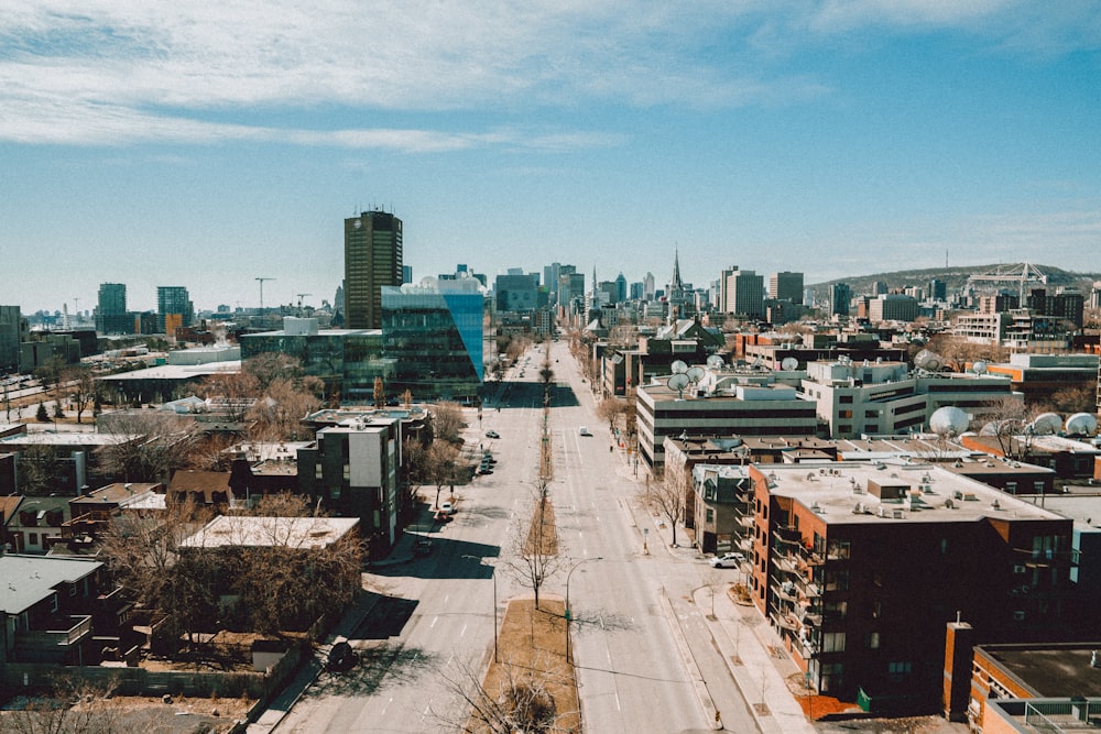 city buildings under blue sky during daytime