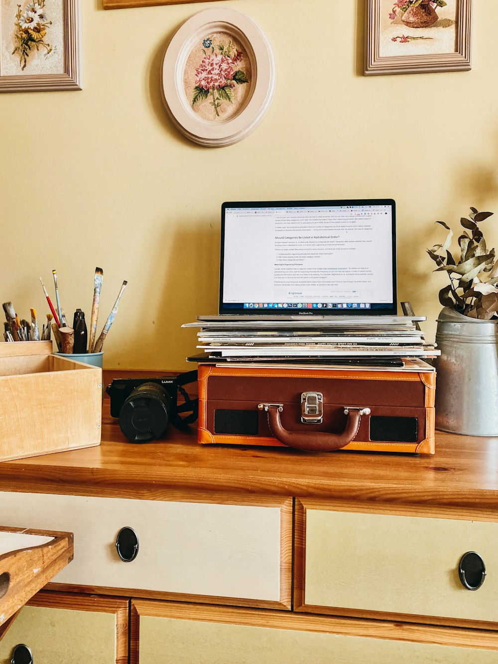 black flat screen computer monitor on brown wooden desk