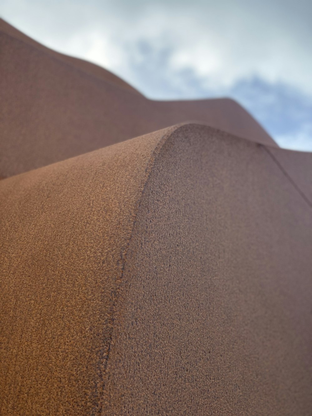 brown textile under blue sky during daytime