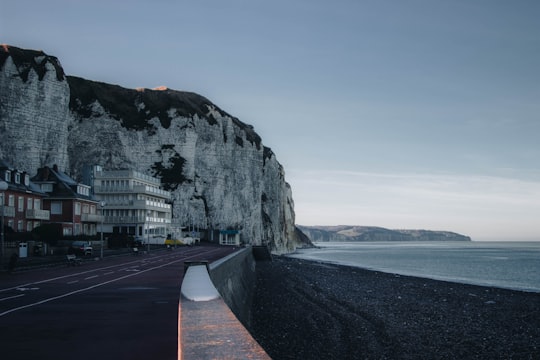 gray concrete road near gray mountain during daytime in Dieppe France