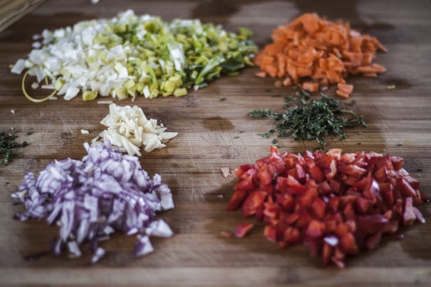 A colorful assortment of fresh vegetables ready for chopping and cooking.