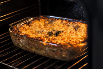 brown and black food on silver tray