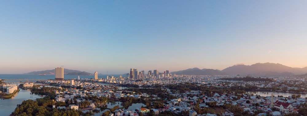 city skyline under blue sky during daytime