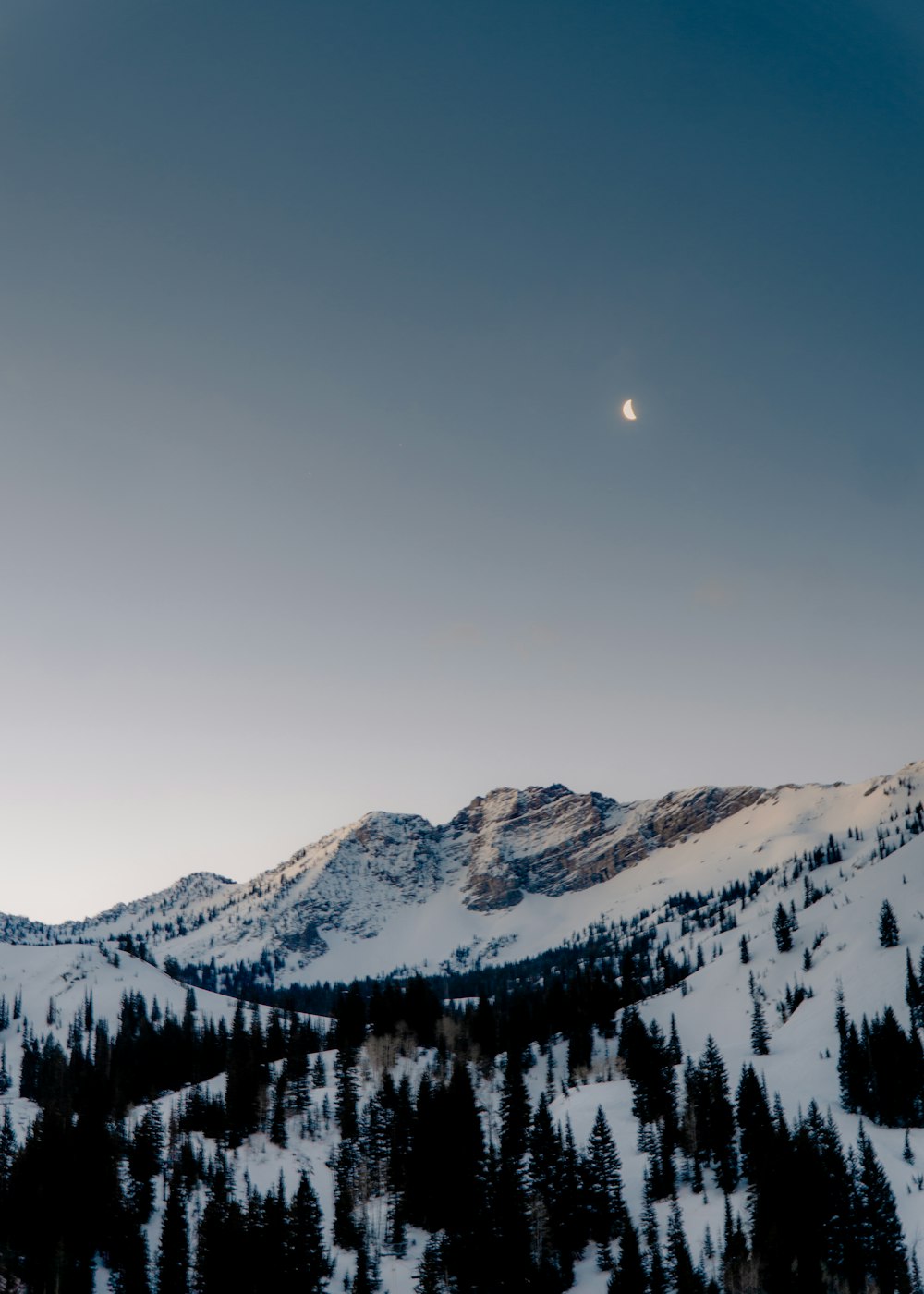 snow covered mountain during daytime