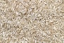 white rice grains on brown wooden table