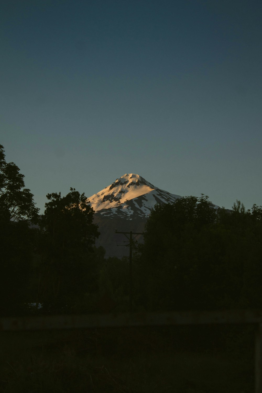 snow covered mountain during night time