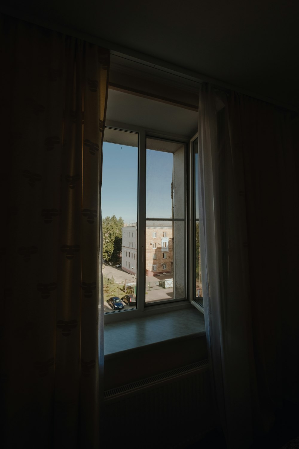 white wooden framed glass window