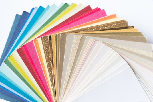 white yellow blue and pink textile