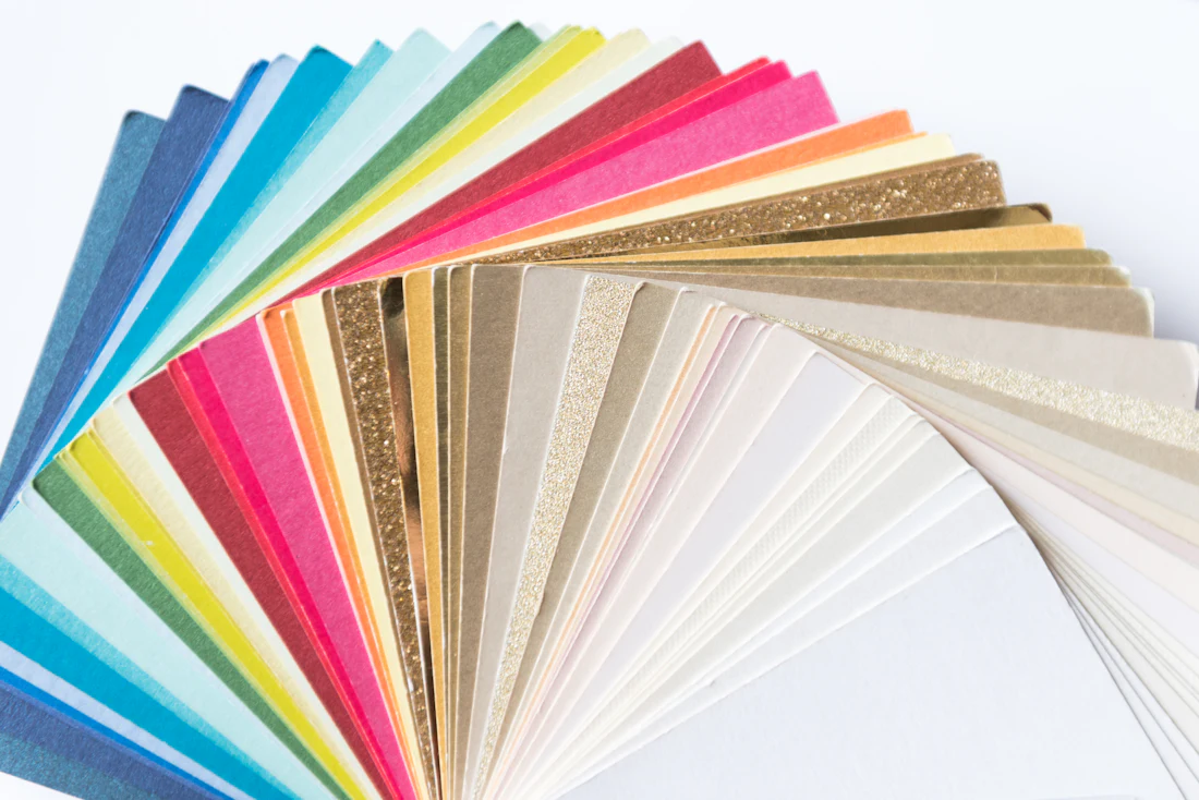 Textured specialty papers in assorted shades