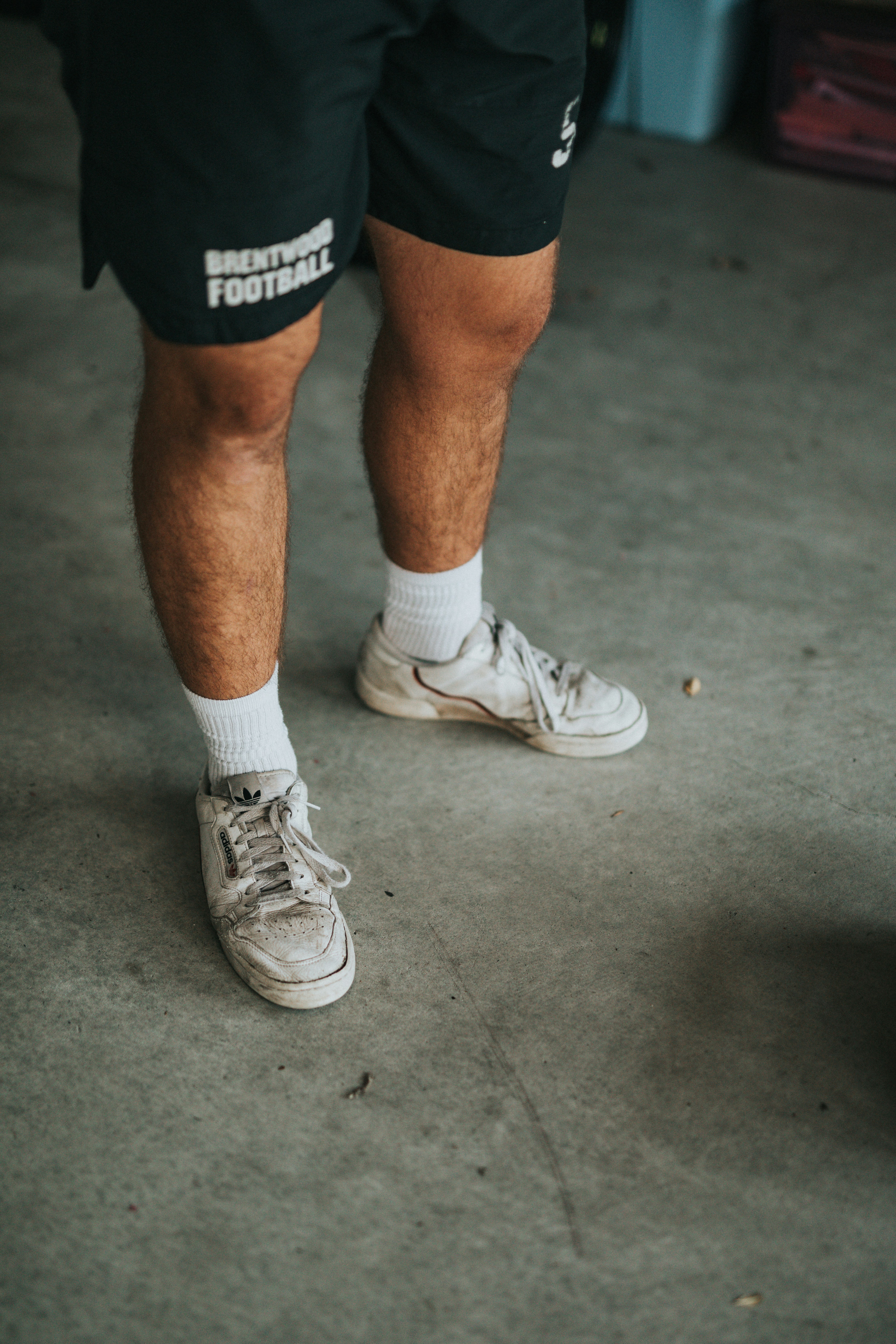 white high top converse with shorts