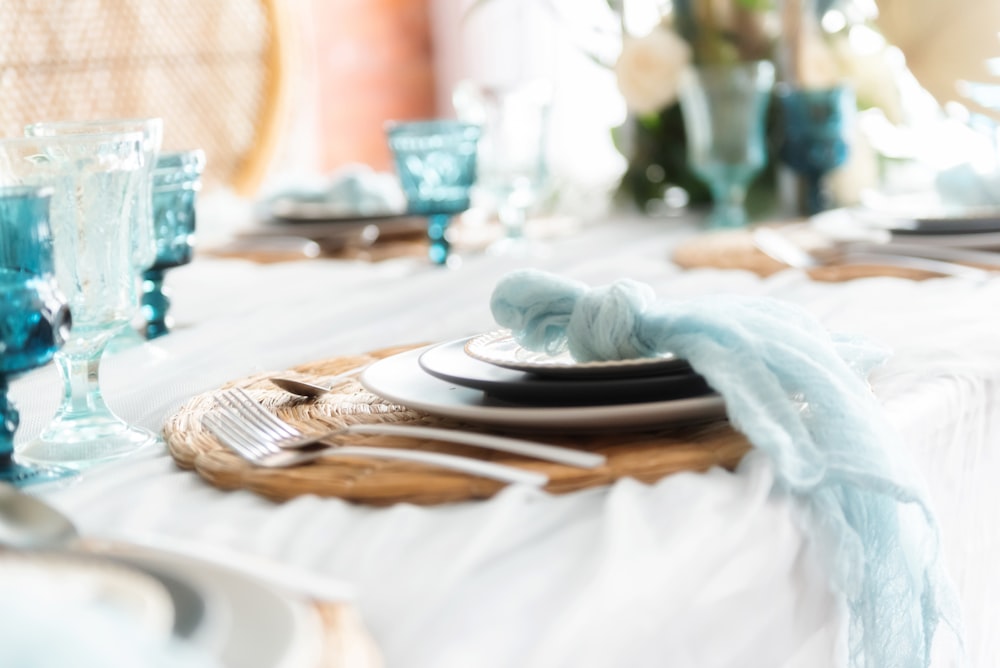 white ceramic plate on brown wooden table