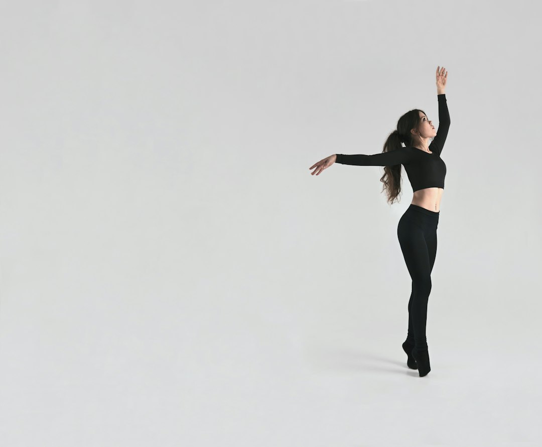 woman in black sports bra and black leggings, Free dance