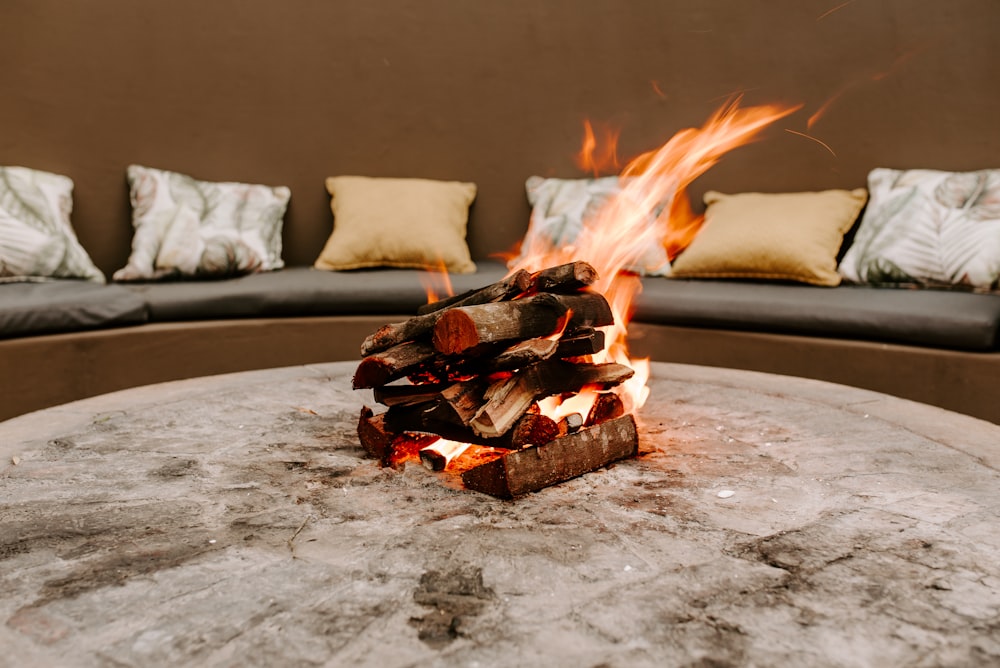 fire on brown wooden table